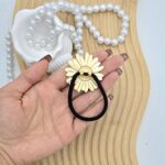 کش مو فلزی مدل گل آفتابگردون